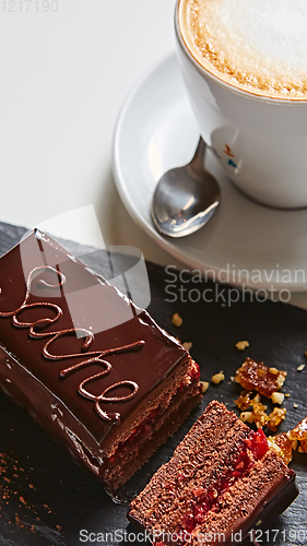 Image of A piece of Sacher cake. Shallow dof.