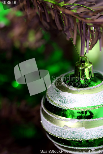 Image of Christmas ornaments on tree.