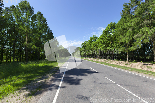 Image of Road along the forest journey Europe