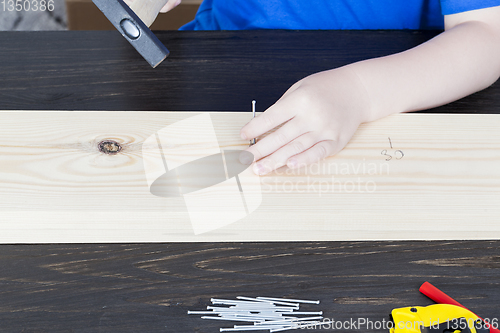 Image of Board repair ruler man hand