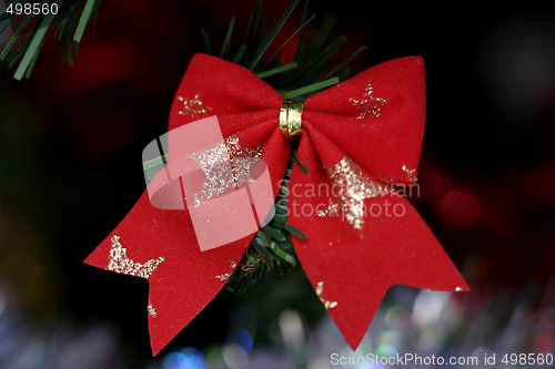 Image of Christmas ornaments on tree.