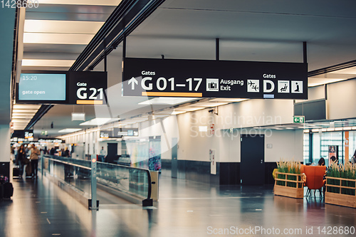 Image of Peoples walking in Vienna airport terminal