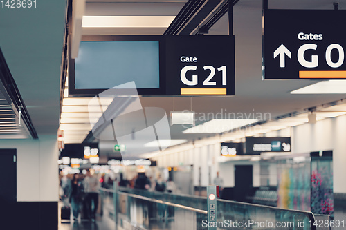 Image of Peoples walking in Vienna airport terminal