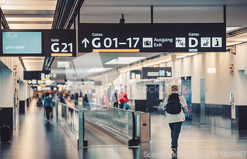 Image of Peoples walking in Vienna airport terminal