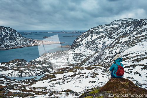 Image of Woman tourist on Lofoten islands, Norway