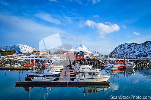 Image of Fishing boats and yachts on pier in Norway