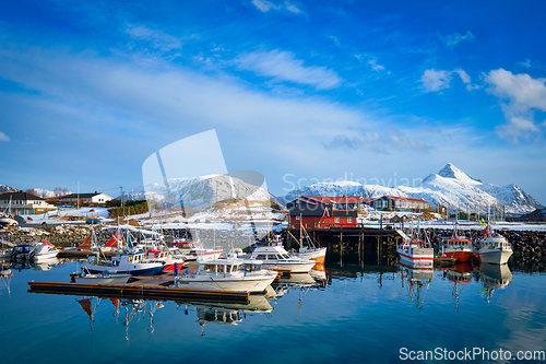 Image of Fishing boats and yachts on pier in Norway