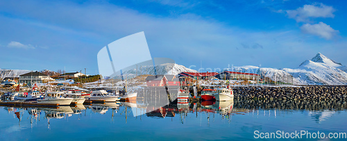 Image of Fishing boats and yachts on pier in Norway