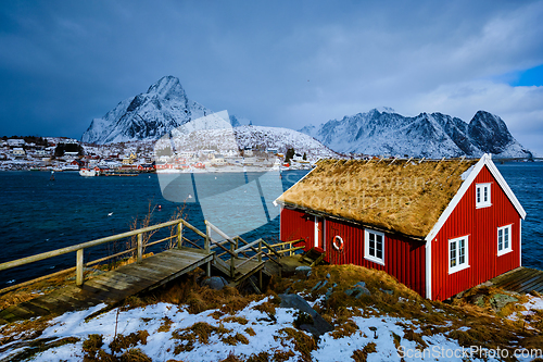 Image of Traditional red rorbu house in Reine village on Lofoten Islands,