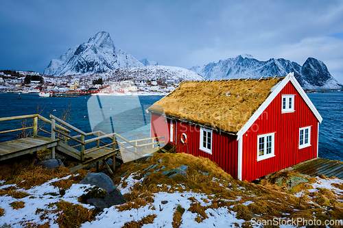 Image of Traditional red rorbu house in Reine village on Lofoten Islands,