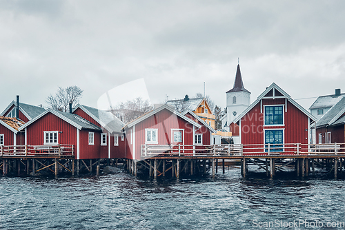 Image of Traditional red rorbu houses in Reine, Norway