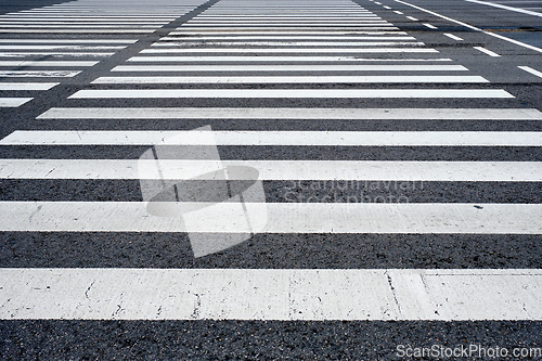 Image of Crosswalk pedestrian crossing in the street