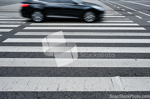 Image of Crosswalk pedestrian crossing in the street