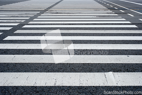 Image of Crosswalk pedestrian crossing in the street