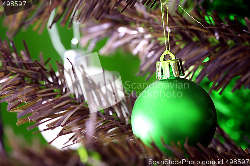 Image of Christmas ornaments on tree.