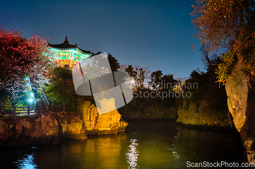 Image of Yongyeon Pond with Yongyeon Pavilion illuminated at night, Jeju islands, South Korea