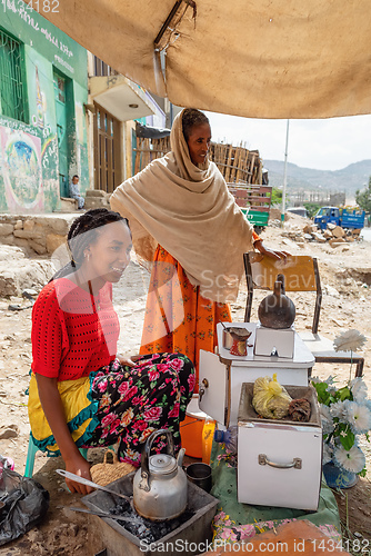 Image of beautiful women preparing bunna coffee, Ethiopia