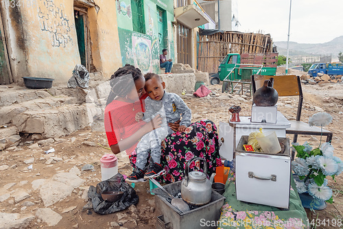 Image of beautiful women preparing bunna coffee, Ethiopia