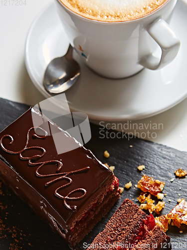 Image of A piece of Sacher cake. Shallow dof.