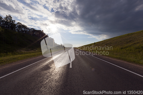 Image of Cloudy rainy road