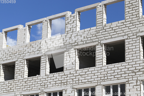 Image of Brick building construction unfinished windows