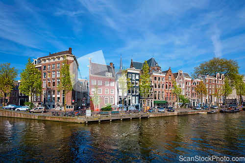 Image of Amterdam canal, bridge and medieval houses