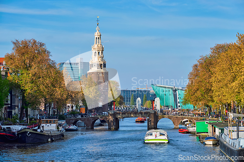 Image of Amterdam canal, bridge and medieval houses