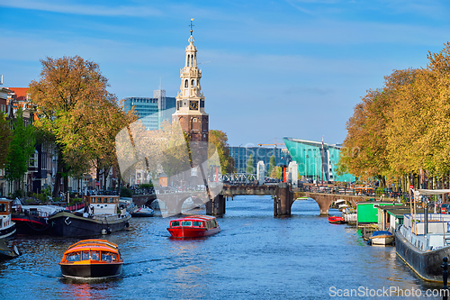 Image of Amterdam canal, bridge and medieval houses