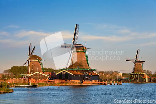 Image of Windmills at Zaanse Schans in Holland in twilight on sunset. Zaa