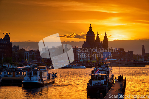 Image of Amsterdam cityscape skyline with Church of Saint Nicholas on su