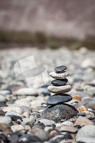 Image of Zen balanced stones stack balance peace silence concept