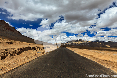 Image of Road on plains in Himalayas with mountains