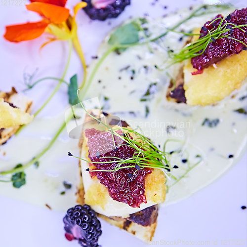 Image of The foie gras with sauce. Shallow dof.