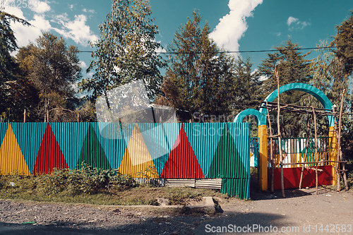 Image of Color painted corrugated iron fence, Ethiopia