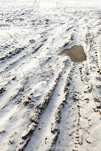 Image of field with snow, the track