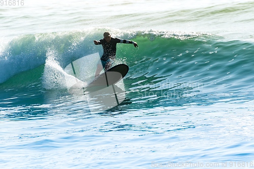 Image of Surfing the waves