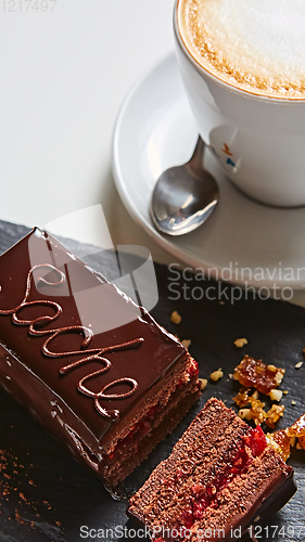 Image of A piece of Sacher cake. Shallow dof.