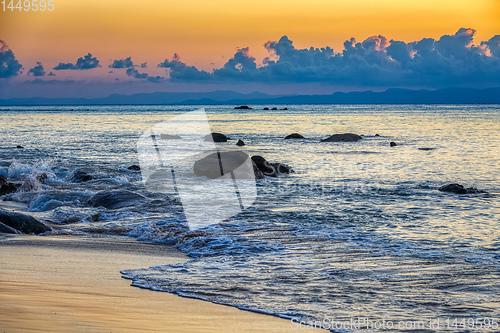 Image of orange sunset over sea, Madagascar