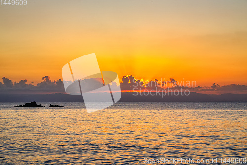 Image of orange sunset over sea, Madagascar