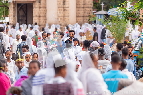 Image of Orthodox Christian pilgrim at worship on the street during easter