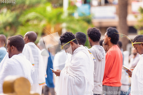 Image of Orthodox Christian pilgrim at worship on the street during easter