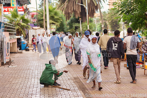 Image of Begging people on the street at Easter