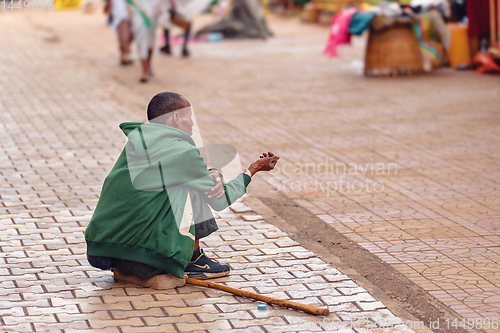 Image of Begging people on the street at Easter