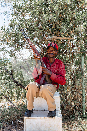 Image of park scout with rifle in Simien Mountain, Ethiopia