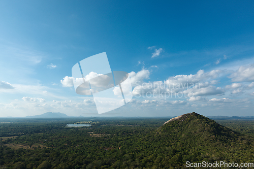 Image of Sky above small mountains