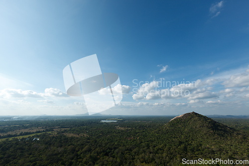 Image of Sky above small mountains