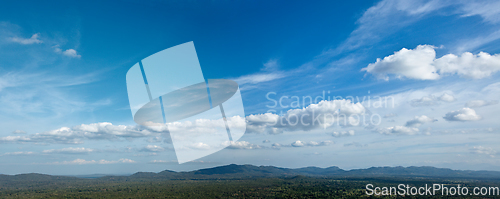 Image of Sky above small mountains