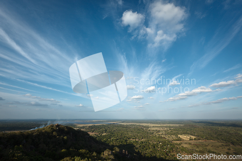 Image of Sky above small mountains