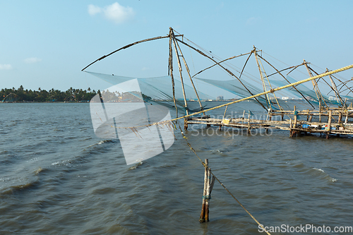 Image of Chinese fishnets on sunset. Kochi, Kerala, India