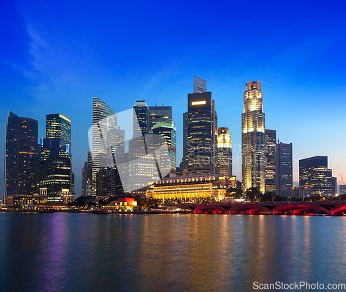 Image of Singapore skyline and river in evening